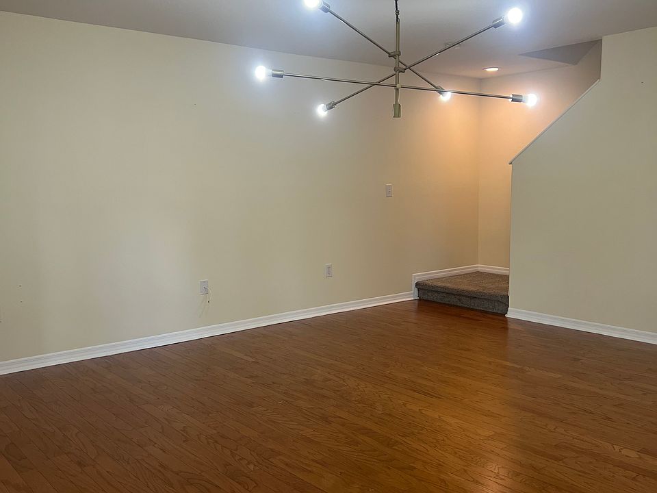 Open space living room, with beautiful wood floors!