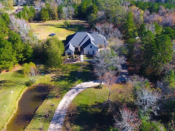 32 Hidden Springs Ranch Dr. is a true Hill Country get away. All the peaceful privacy of the country with the city minutes away.