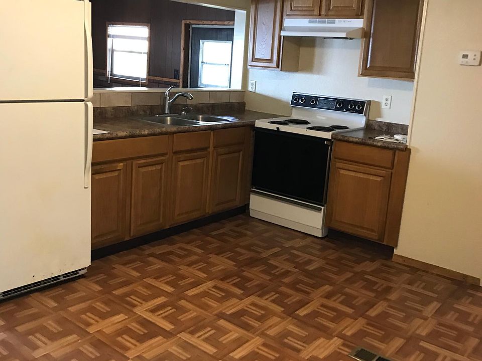 Kitchen cabinets and countertops fairly new has a large walk-in-pantry on west side