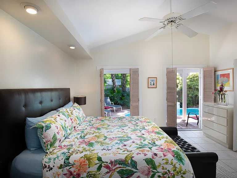 Master bedroom leads to pool.