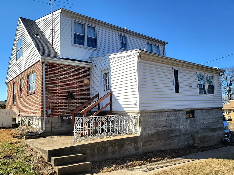 Back of house, back patio, and back entrance