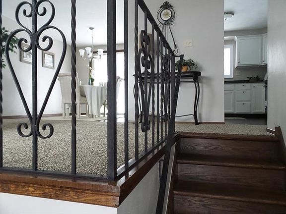 Welcome home - original charm mixed with updated carpet, paint, kitchen, gameroom and baths.