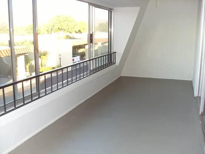 Large Arizona room (enclosed balcony) off master bedroom with stunning 180 degree view of Catalina Mtns.