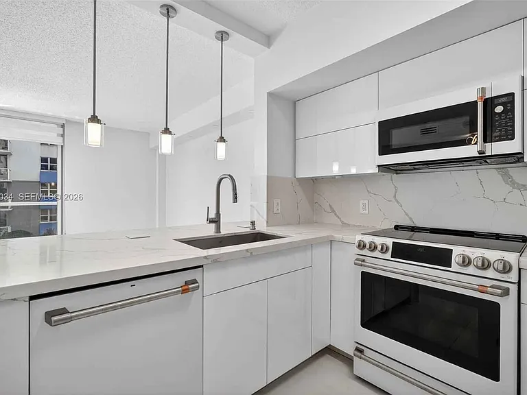 5077 NW 7th St — Photo 21
