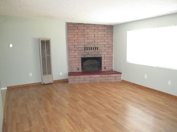 Cozy fireplace burns wood & has natural gas