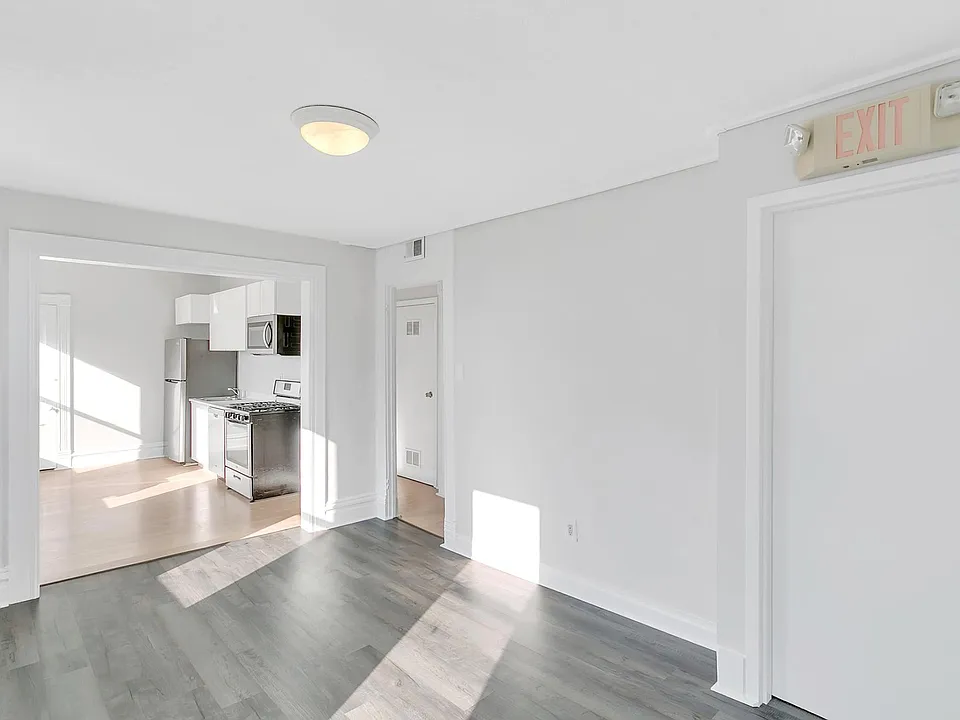 Large open concept living room, kitchen, and dining room.