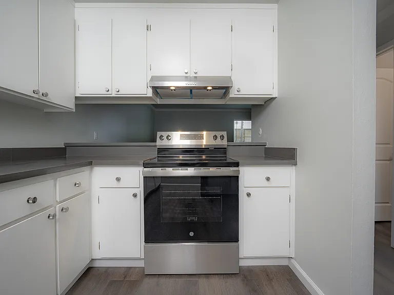 Embrace a sleek, modern culinary experience in this well-appointed kitchen.