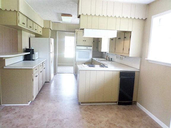 Includes a trash compactor to the right!