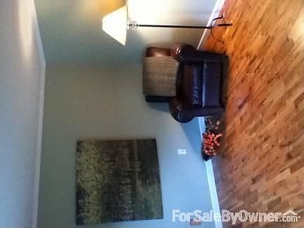 Living room
						:
						Please note the crown moulding and beautiful wood floors