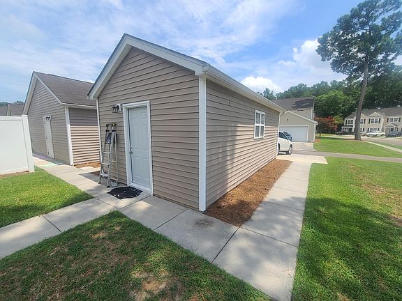 Entry into garage/storage area from back of the house = this part is condition for now. With a mini-split unit remote controlled