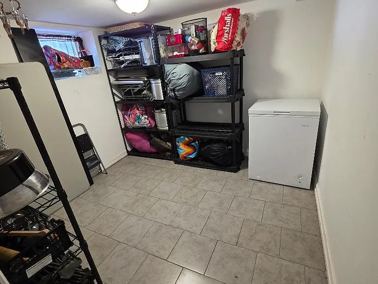 View of storage room in basement