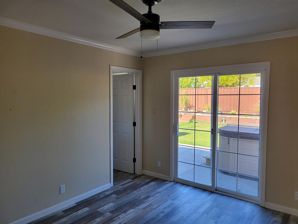 Master bedroom with sliding glass door to yard.
