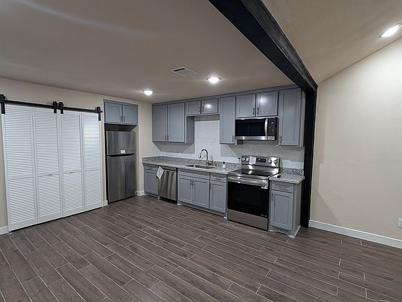 Custom Gourmet Kitchen with granite countertops and Brand New LG Stainless Steel Appliances