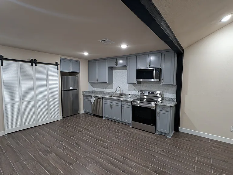 Custom Gourmet Kitchen with granite countertops and Brand New LG Stainless Steel Appliances