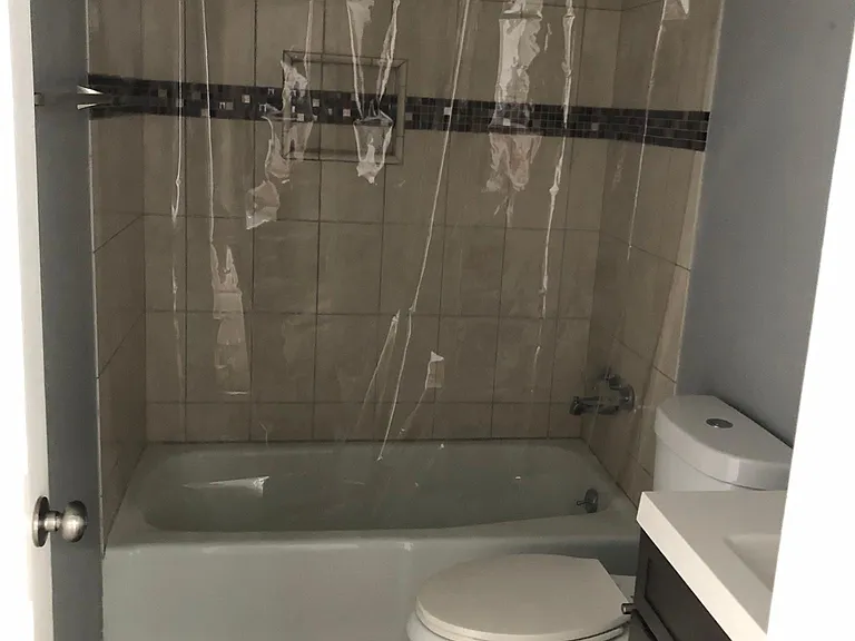 Second full bath with custom tile.