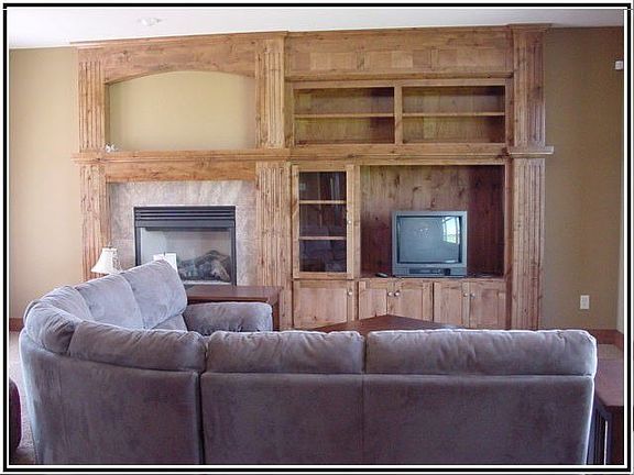 Relax by the fireplace with built-in surround