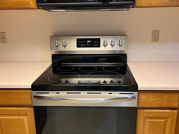 Ceramic cooktop range and over-range microwave