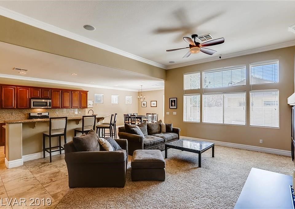 11' Ceiling make a GREAT Room.  Transom Windows Provide Natural Light.