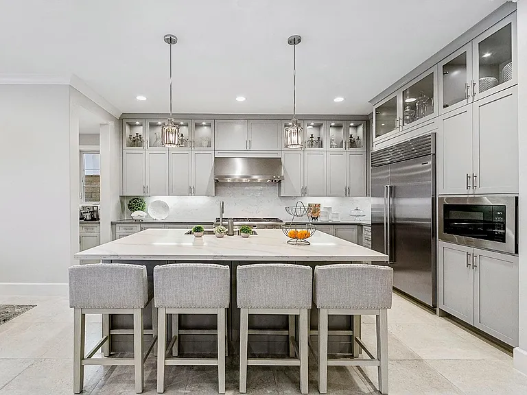 Custom gorgeous cabinets all the way to the ceiling and with glass... All in the professionally designed perfect color pallette!