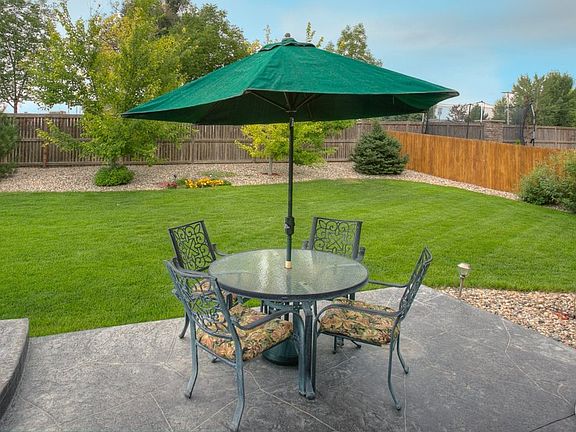 Expansive Stamped Concrete Patio, Open Behind