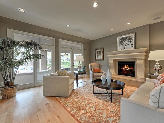 Lush curb appeal with welcoming front porch