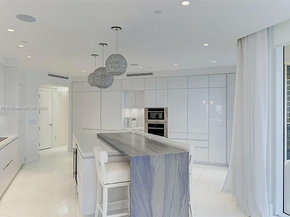 2nd image of 10225 Collins Ave #301-303