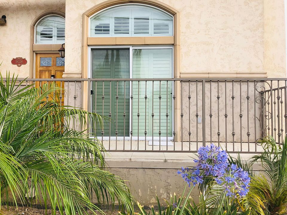 Home front with front porch. HOA maintained landscaping