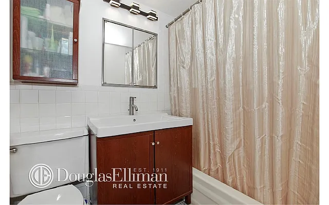 Sold by Douglas Elliman | media 9