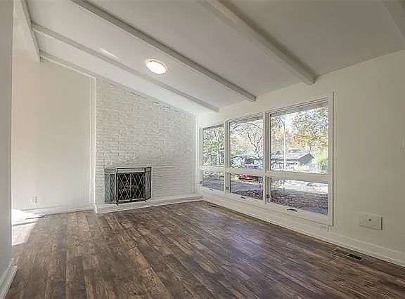 Large living room with luxury vinyl plank flooring