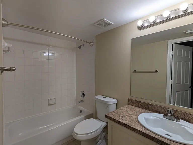 5011 Wiles Rd #208 — Photo 8