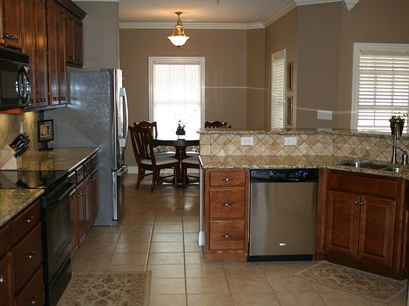 Kitchen with view of breakfast room