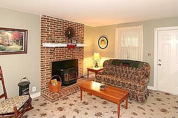 Living Room with Wood Burning Fireplace