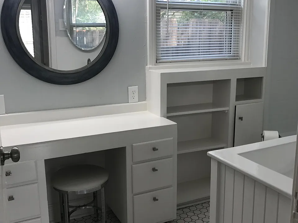 Bathroom with new tile, plus built-in storage and vanity