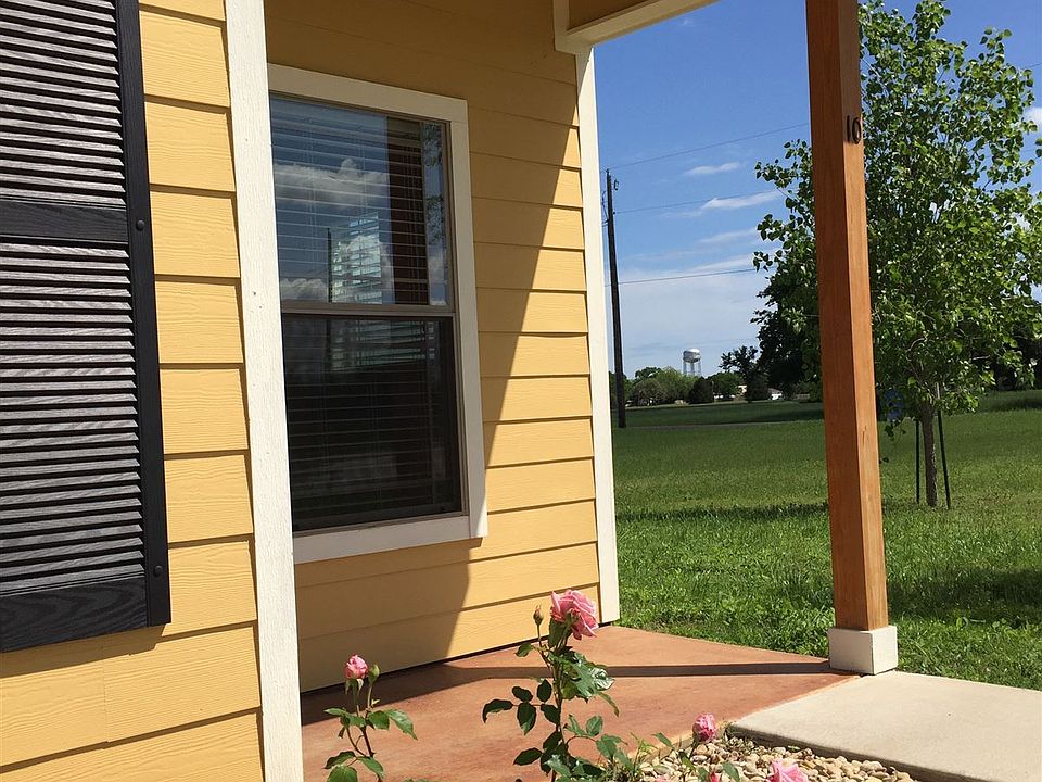 Roses in the front, water tower in the back!