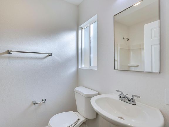 Updated bathroom with large tile floor