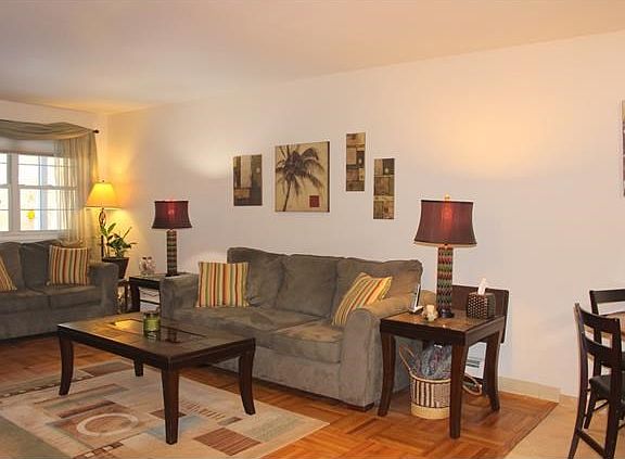 Living room with hardwood flooring.