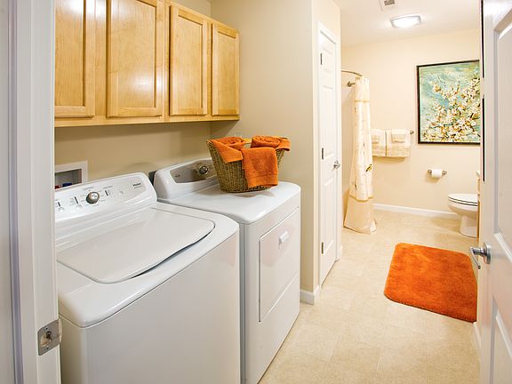 Washer and dryer hook-ups in every home. Walk in showers in