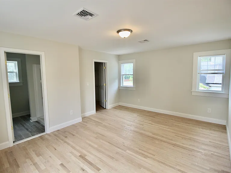 Newer spacious primary bedroom.