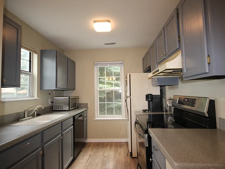 Gray Cabinetry and Quartz tops