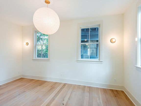 The living space is to the right of the entryway. Great light fixtures make for a cozy living space!