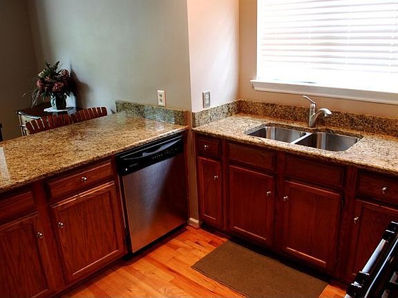 kitchen with granite counters and stainless appliances