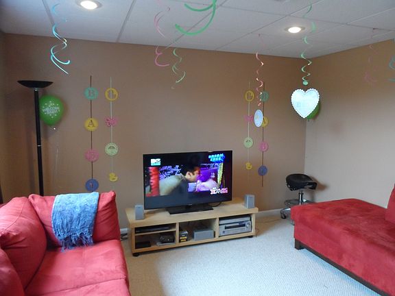 fully furnished/carpeted basement with walk out under the de