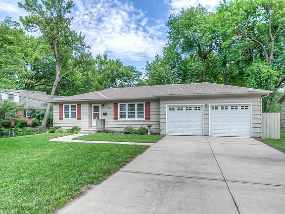 The driveway offers good space and the garage too! Newer insulated garage doors and a keypad.