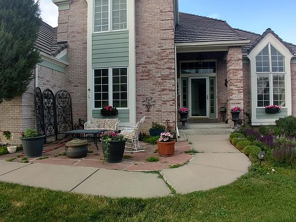 Front patio includes furniture