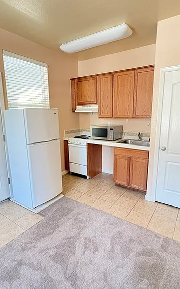 1561 Jainine St — Photo 3