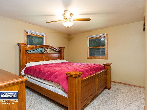 Master Bedroom With Lighted Fan
