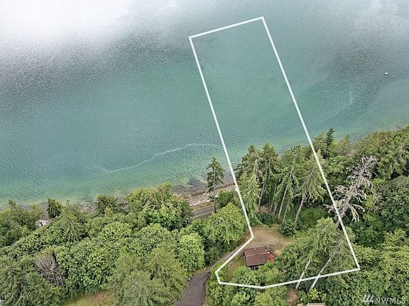 Two parcels here - the cabin is on one, and the hillside and tidelands are on the second parcel.  165' of salt water front ensures your view forever!  