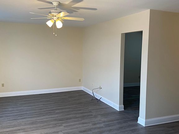 from the kitchen/ dinning room area looking into the living room ( large space new floors & paint)