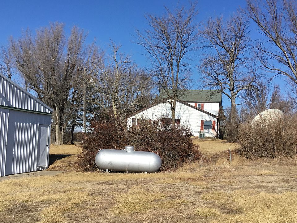 Steel bldg south of house