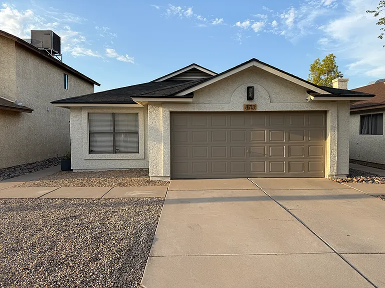 8713 W Bluefield Ave — Photo 1